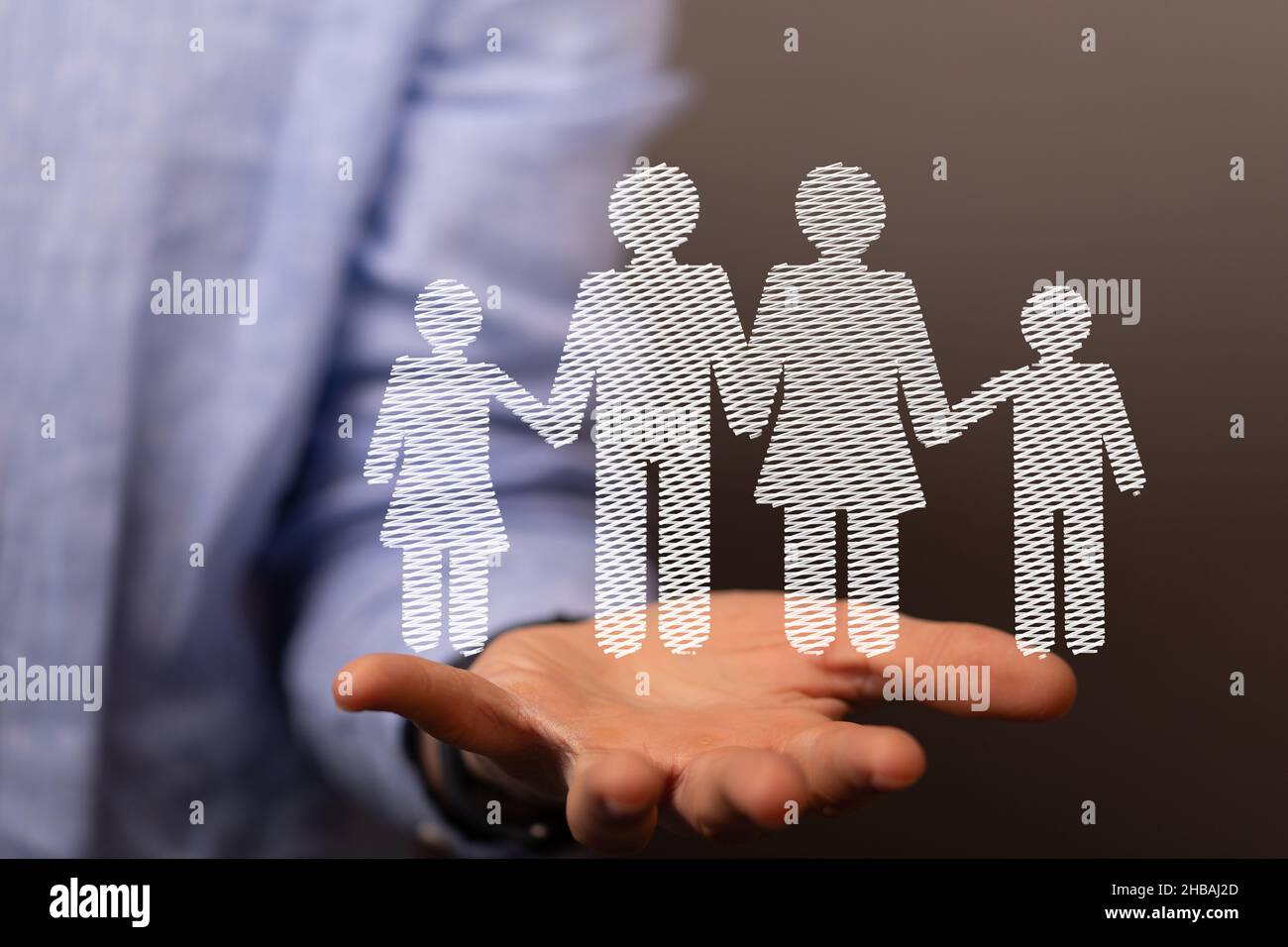 3d rendered family members hovering over a man's hand Stock Photo - Alamy