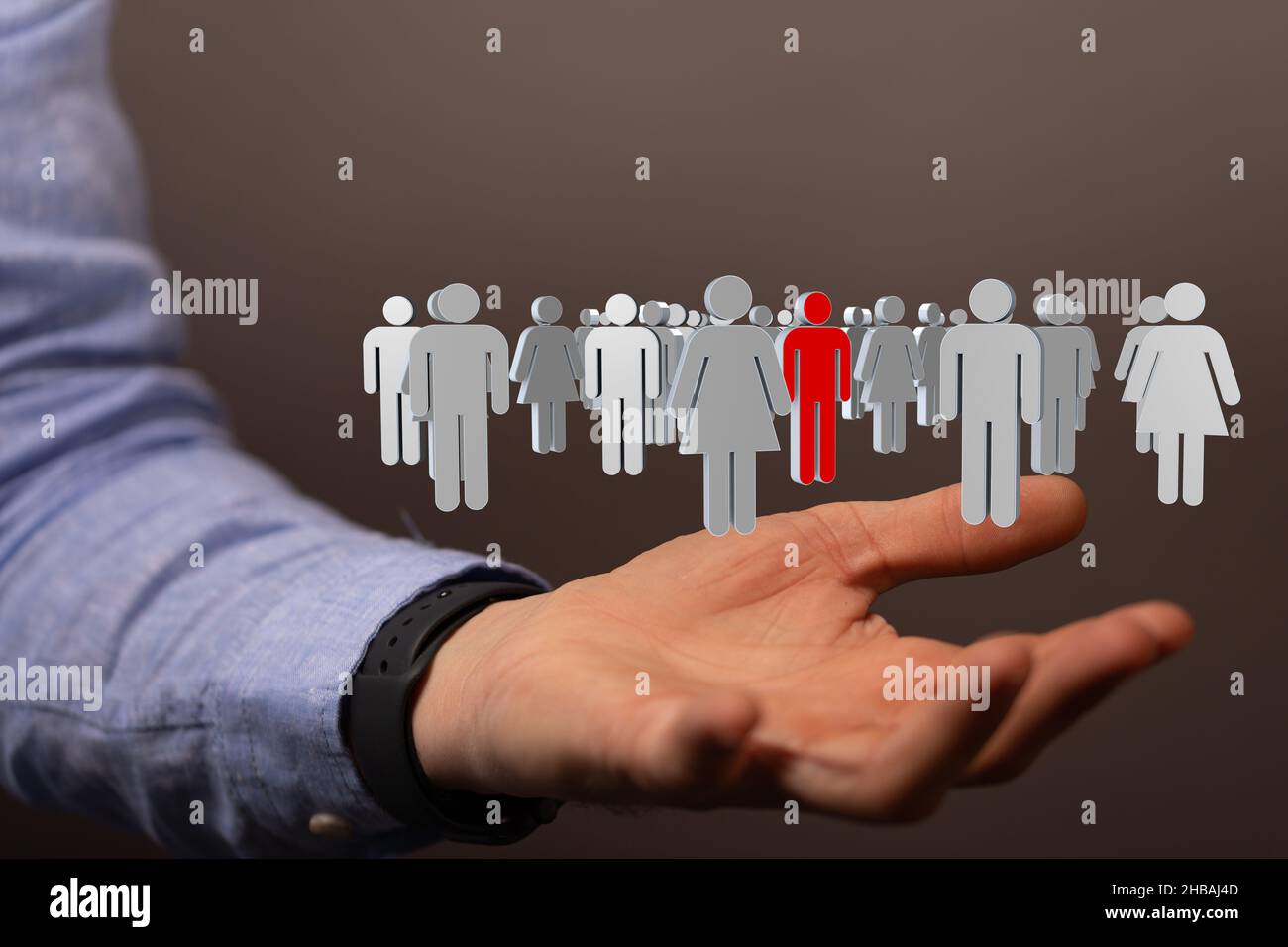 3D rendered people icons hovering over a person's hand Stock Photo - Alamy