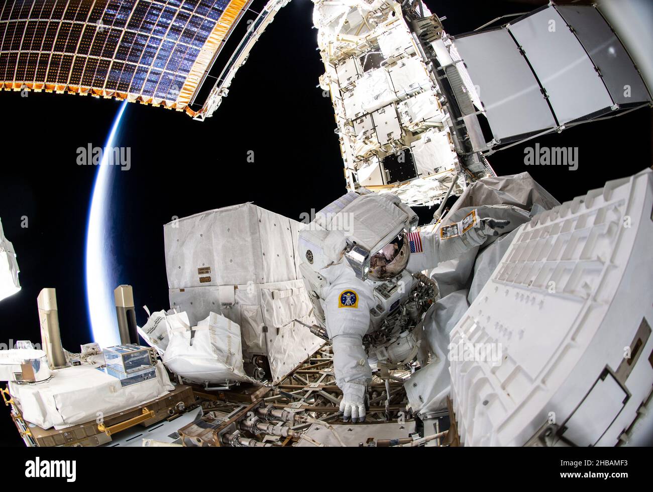 Spacewalk, International Space Station, Dec. 2, 2021. NASA crew member Kayla Barron is pictured during a 6-hour and 32 minute spacewalk to replace a failed antenna system on the International Space Station's Port-1 truss structure.  A digitally optimised version of a NASA image. Credit: NASA. NB: Usage restrictions: Not to be presented as an endorsement - Editorial Use only. Stock Photo