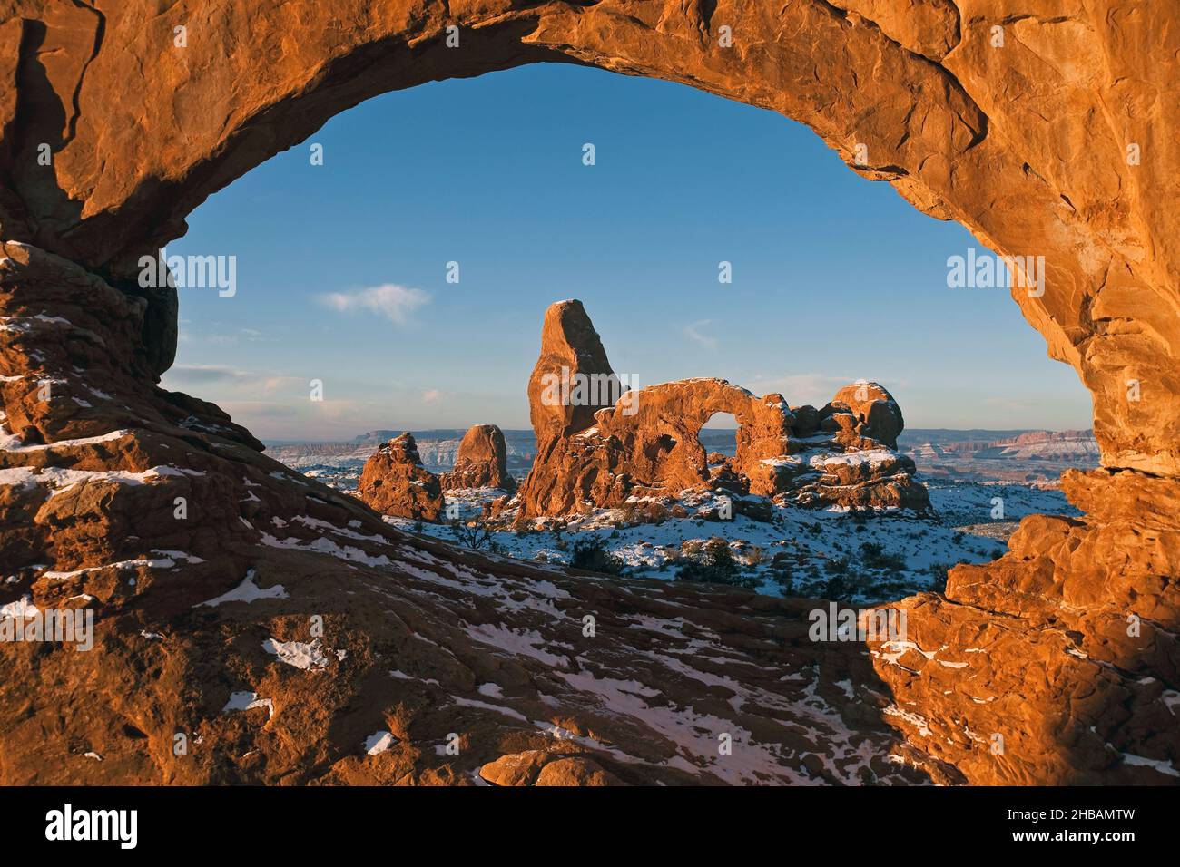 Sunrise on Turret Arch Framed by North Window Arches National Park, Utah, United States of America  A unique, optimised version of an image by NPS Ranger JW Frank; Credit: NPS/Jacob W. Frank Stock Photo