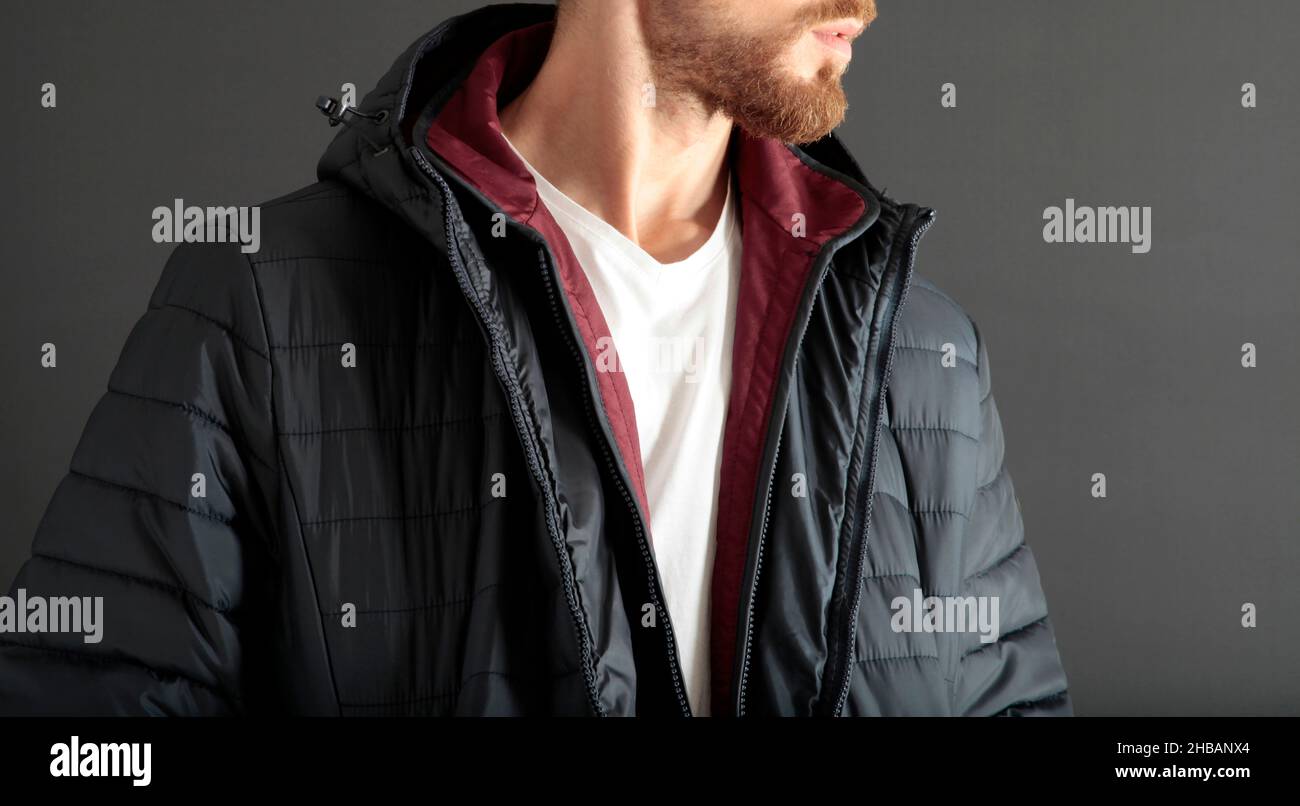 Navy blue down jacket. Men's clothing Stock Photo Alamy