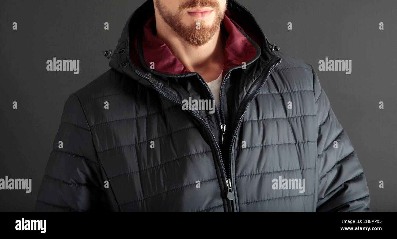 Navy blue down jacket. Men's clothing Stock Photo Alamy