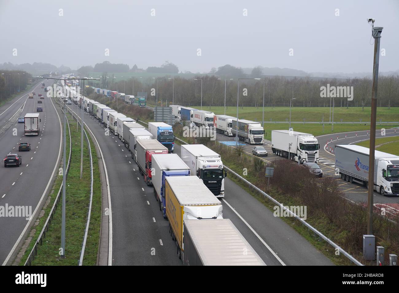 Freight lorries queuing on the M20 motorway in Kent heading to Dover at 11A the Channel Tunnel