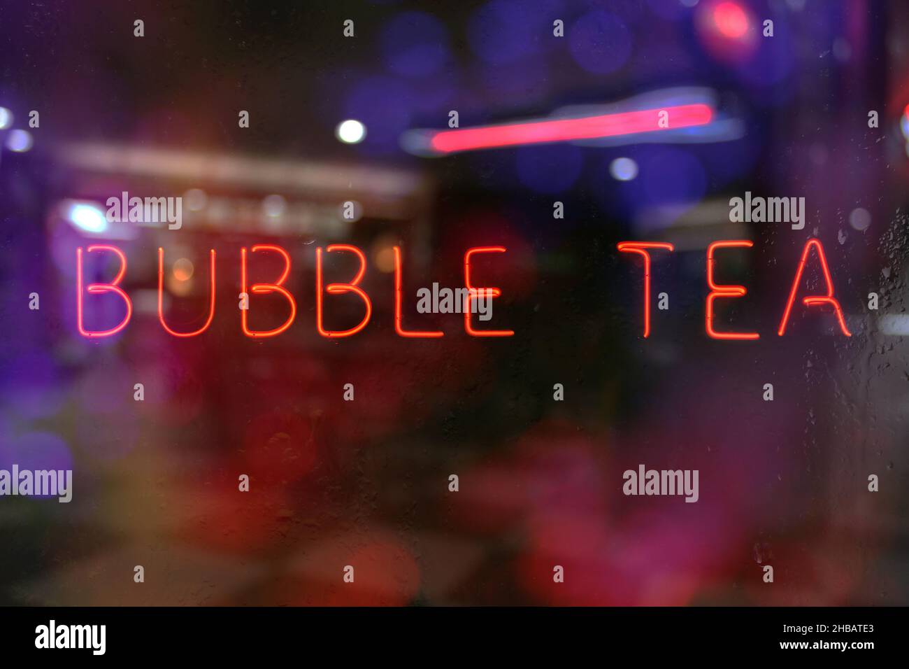 Vintage Neon Bubble Tea Sign in Window of Restaurant Stock Photo - Alamy