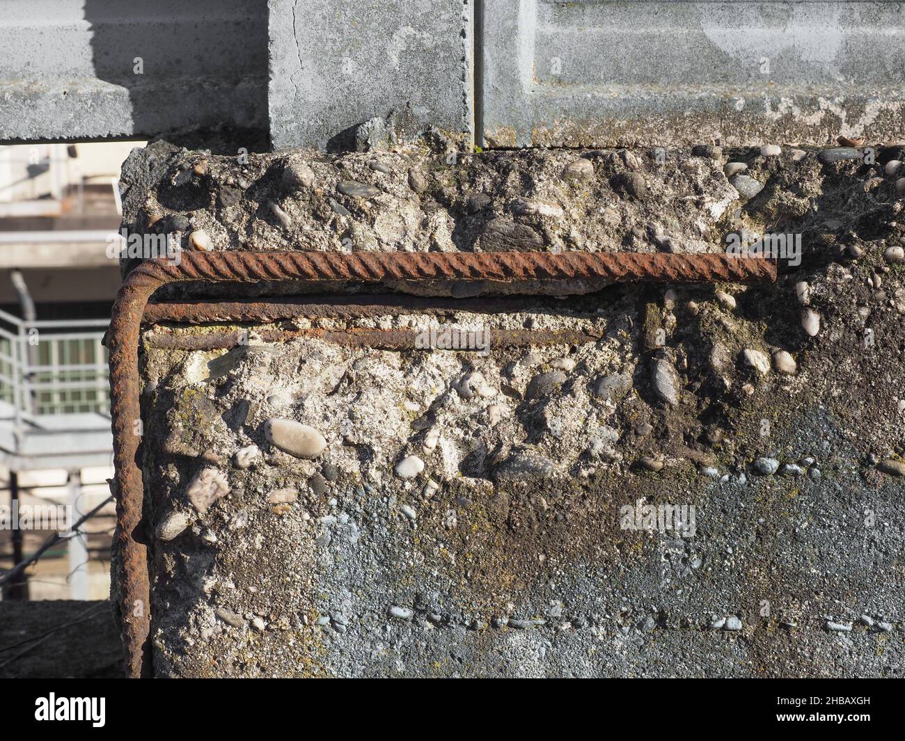 damaged reinforced concrete with exposed rusted steel resistance bars ...