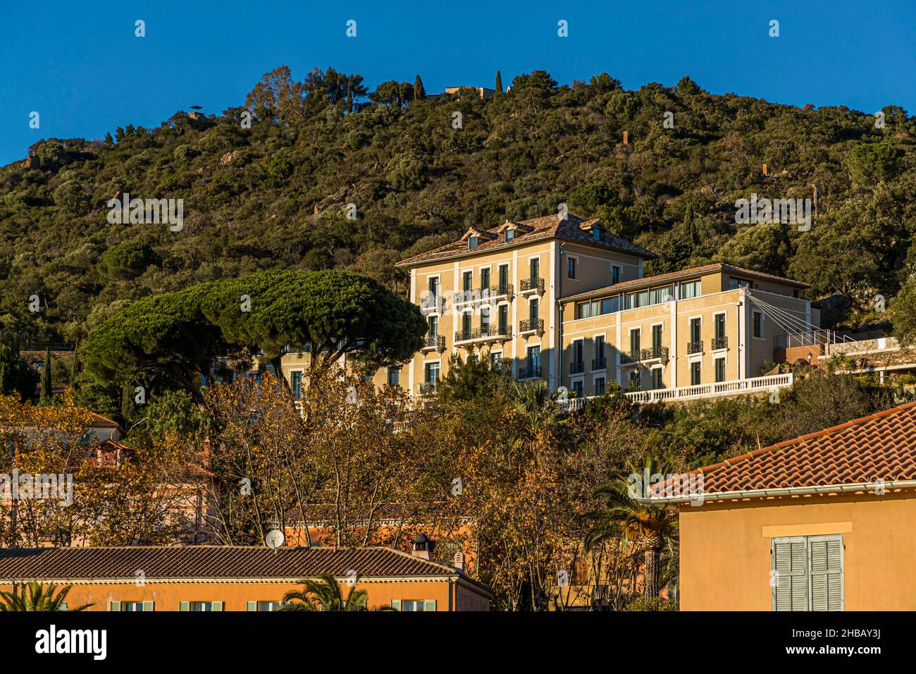 City view of Bormes-les-Mimosas (France) bathed in Mediterranean evening light Stock Photo