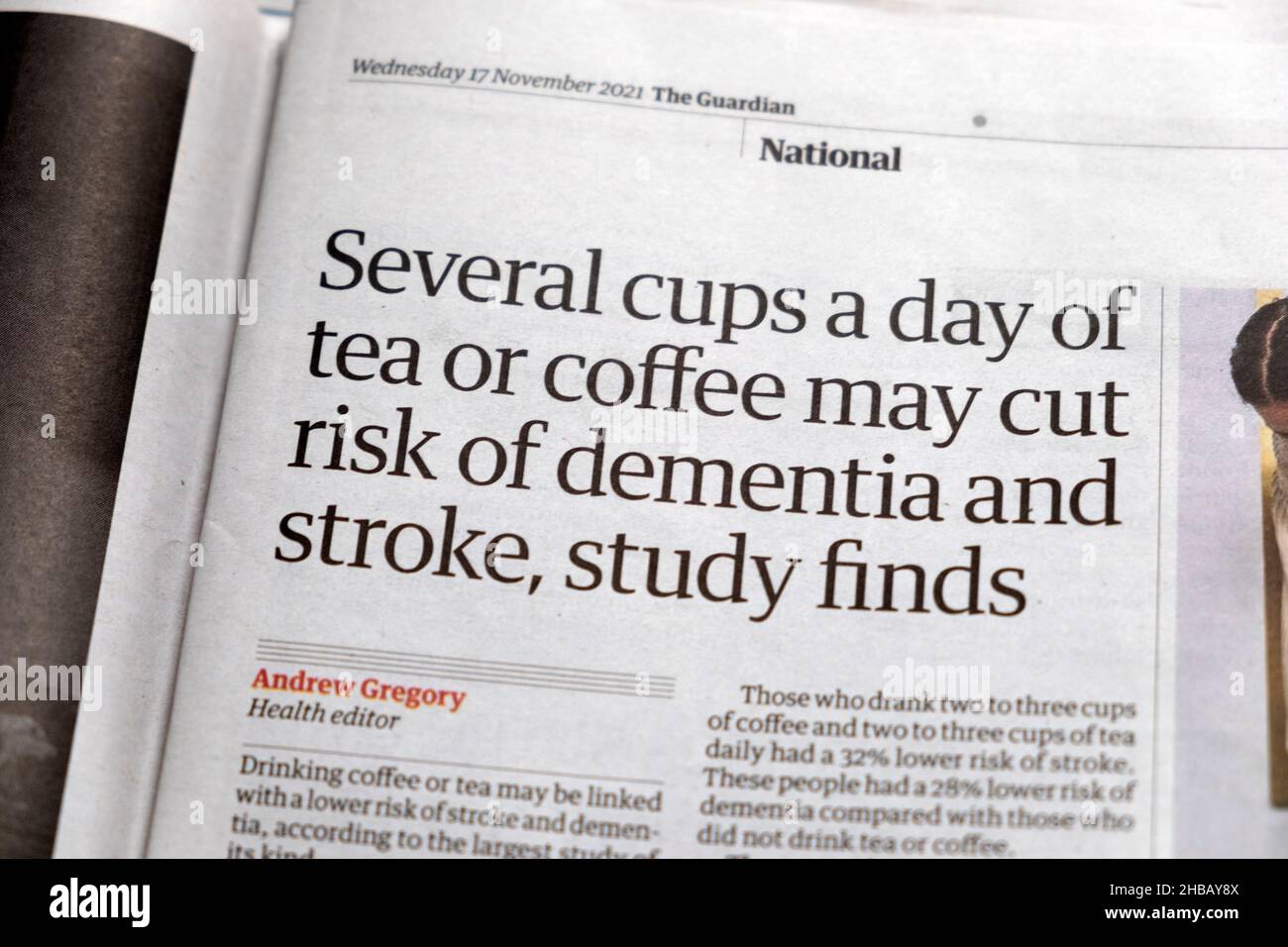 'Several cups a day of tea or coffee may cut risk of dementia and stroke, study finds' Guardian newspaper headline clipping on17 November 2021 UK Stock Photo