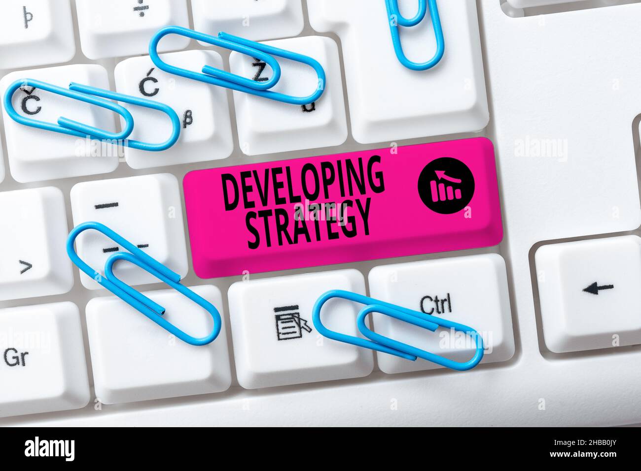 Handwriting text Developing Strategy. Business idea Organizations Process Changes to reach Objectives Practicing Speed Typing Accuracy, Testing Stock Photo