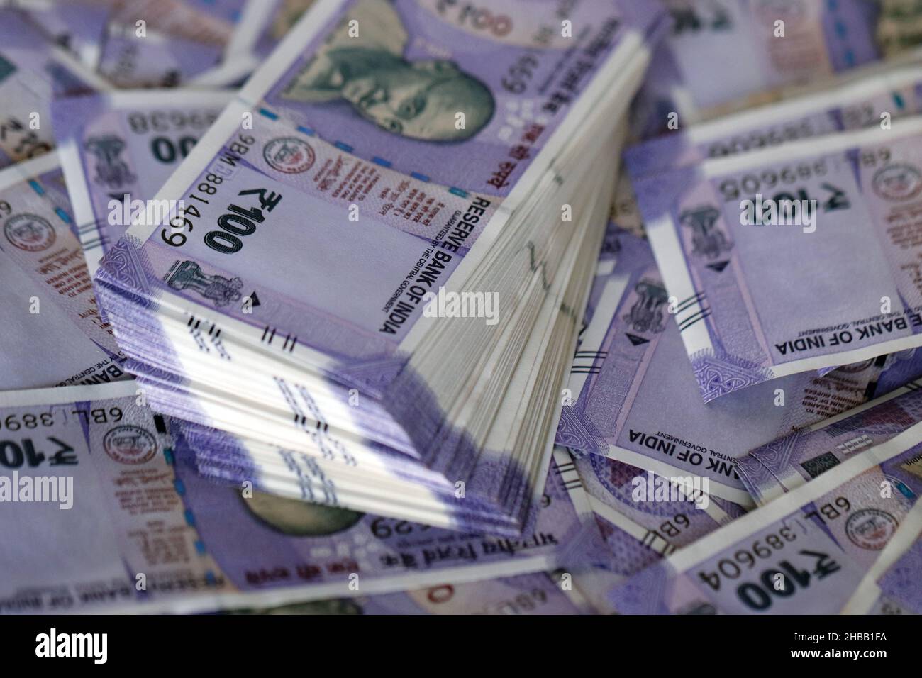 Stack of One hundred Indian rupee notes background, Indian currency bundle notes. Stock Photo