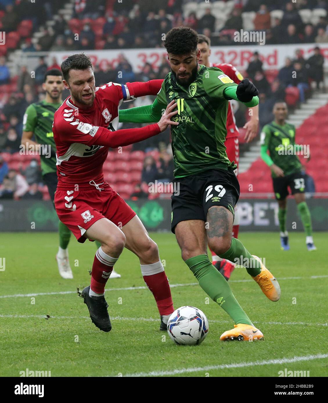Middlesbrough's Jonny Howson and Bournemouth's Philip Billing (right)  battle for the ball during the Sky Bet Championship match at Riverside  Stadium, Middlesbrough. Picture date: Saturday December 18, 2021 Stock  Photo - Alamy