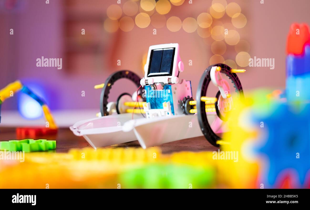 DIY Solar robot on table with kids toys at home concept of childrens