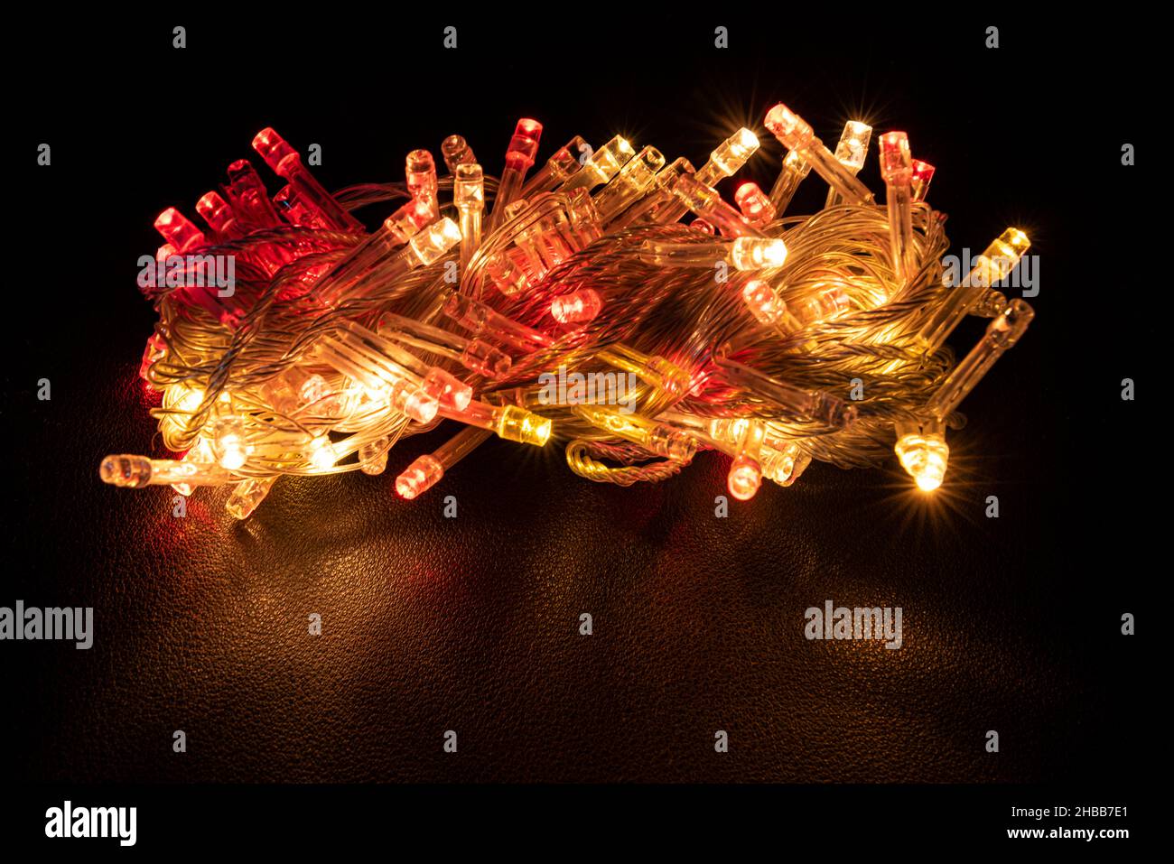 Christmas colored lights on a black background Stock Photo Alamy