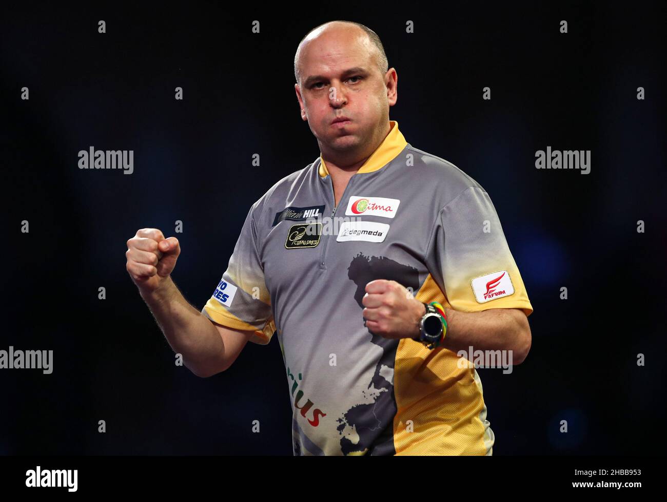 Darius Labanauskas celebrates after hitting a nine-dart finish in his match  against Mike De Decker during day four of the William Hill World Darts  Championship at Alexandra Palace, London. Picture date: Saturday