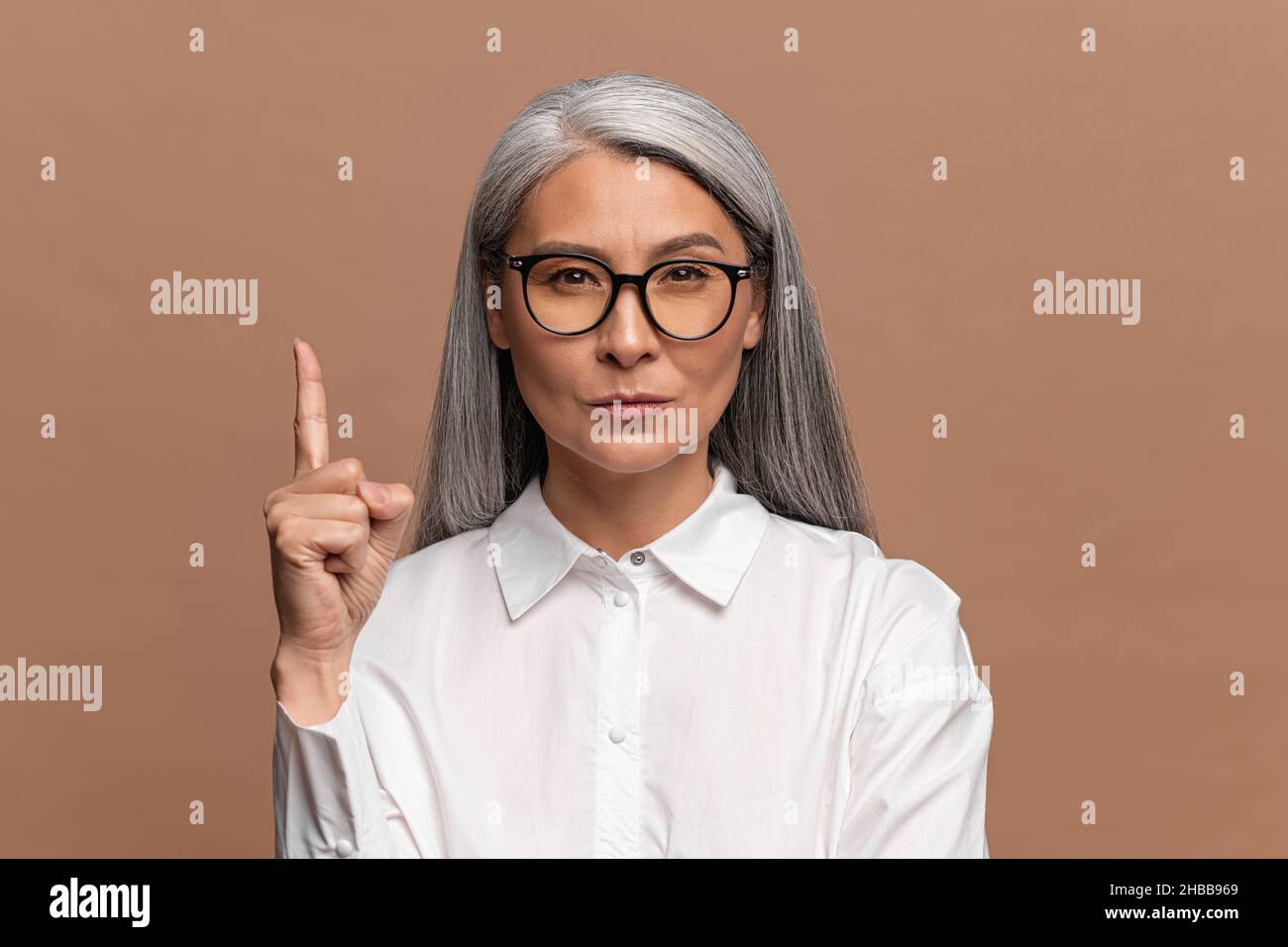 Elderly woman long grey hair hi-res stock photography and images - Alamy