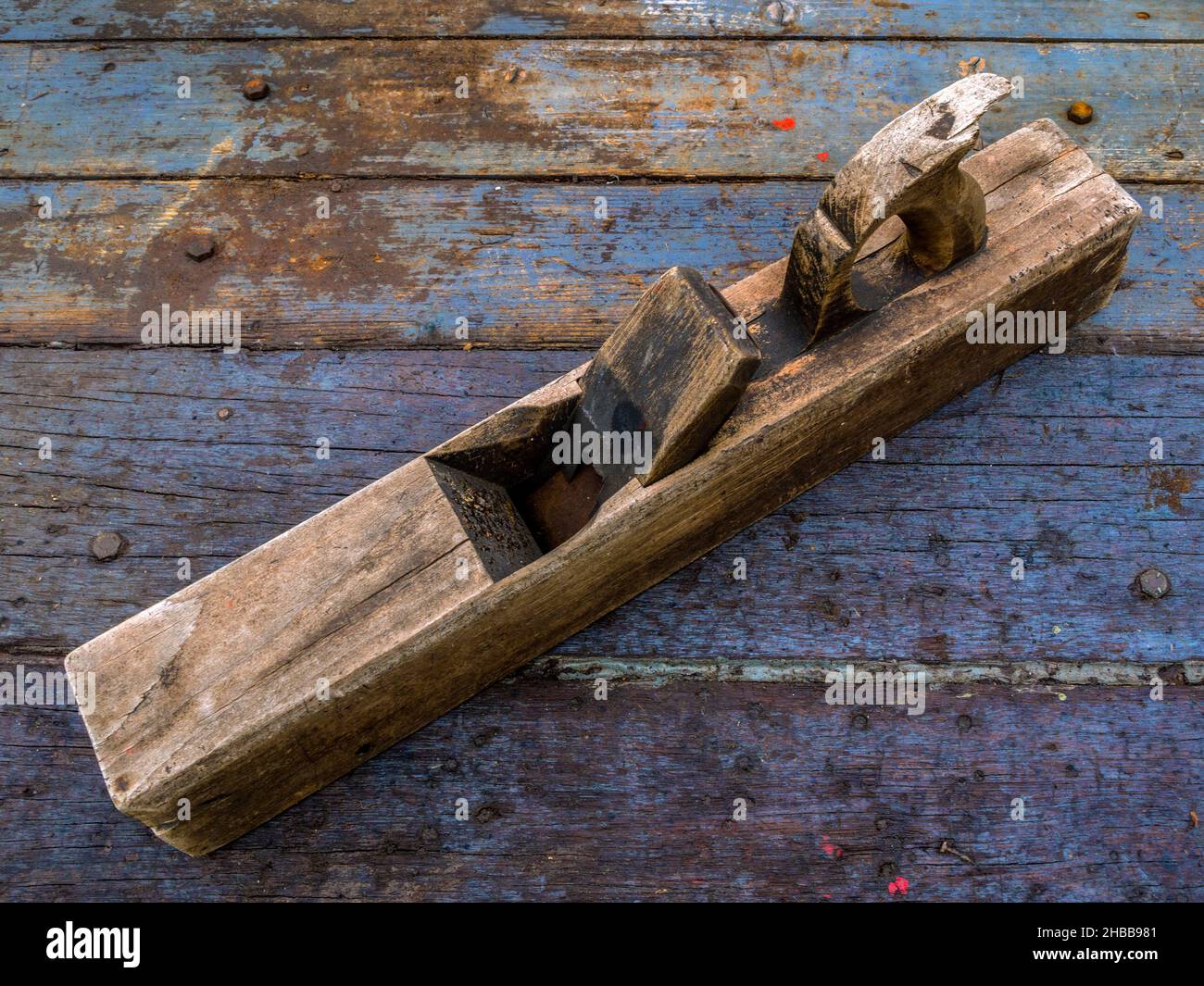 Old Wooden Block Plane on Workbench Stock Photo