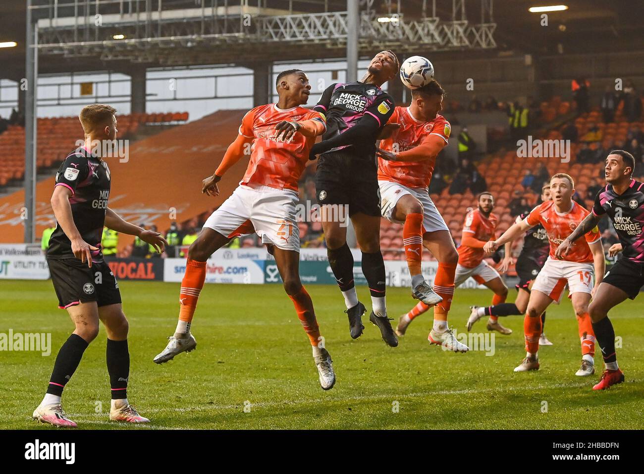 Blackpool, UK. 18th Dec, 2021. Gary Madine #14 of Blackpool and Jonson Clarke-Harris #9 of Peterborough United battles for the ball in ,  on 12/18/2021. (Photo by Craig Thomas/News Images/Sipa USA) Credit: Sipa USA/Alamy Live News Stock Photo
