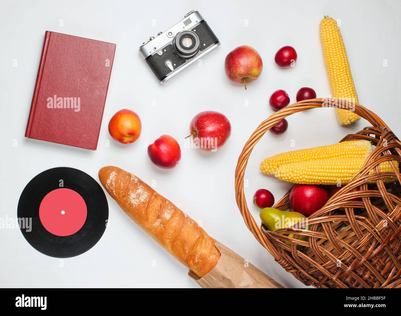 French retro style picnic. Basket with fruits and vegetables, retro