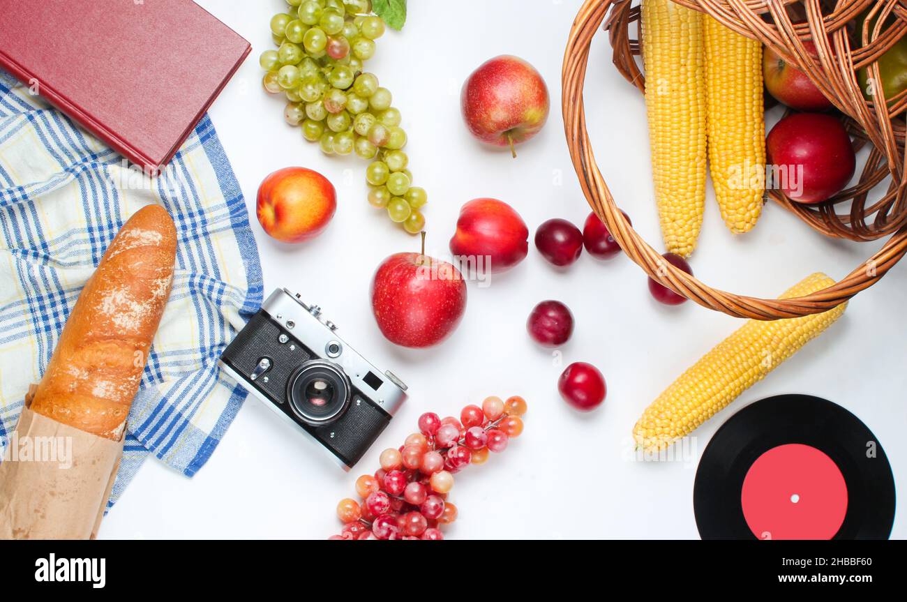 French retro style picnic. Basket with fruits and vegetables, retro