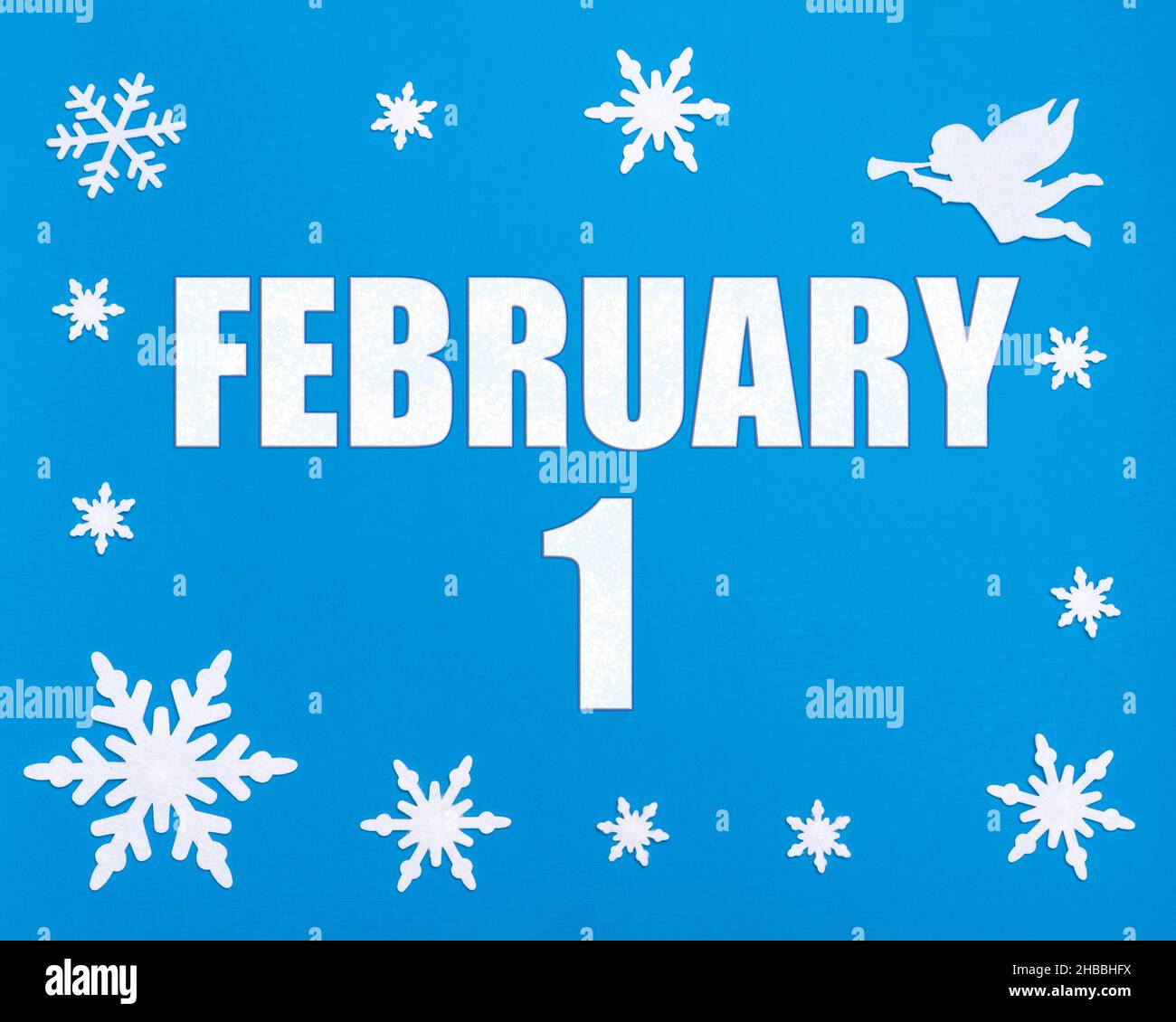 February 1st. Winter blue background with snowflakes, angel and a