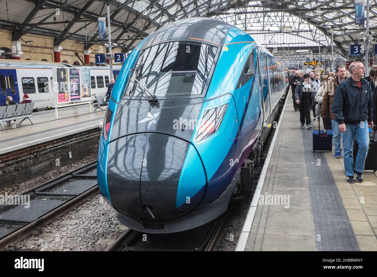 High speed,Trans Pennine,just,arrived, at, Liverpool,from,Newcastle,The rail  route between Newcastle to Liverpool is operated by First Transpennine  Express,train,company,train,carriage,from  Newcastle,to,Liverpool,at,platform,Lime Street,train station ...