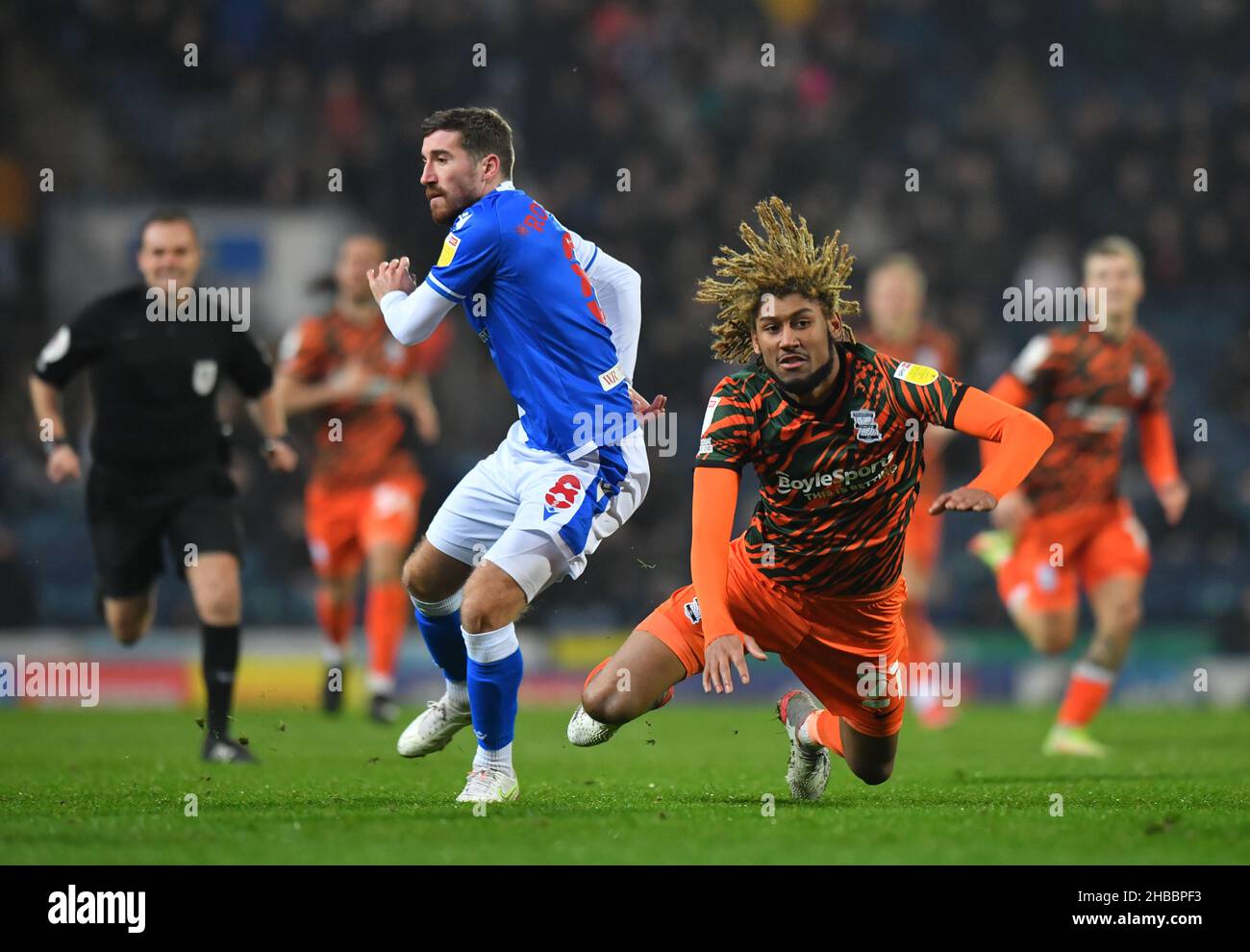 Blackburn Rovers' Joe Rothwell (left) and Birmingham City's Dion Sanderson clash during the Sky Bet Championship match at Ewood Park, Blackburn. Picture date: Saturday December 18, 2021. Stock Photo