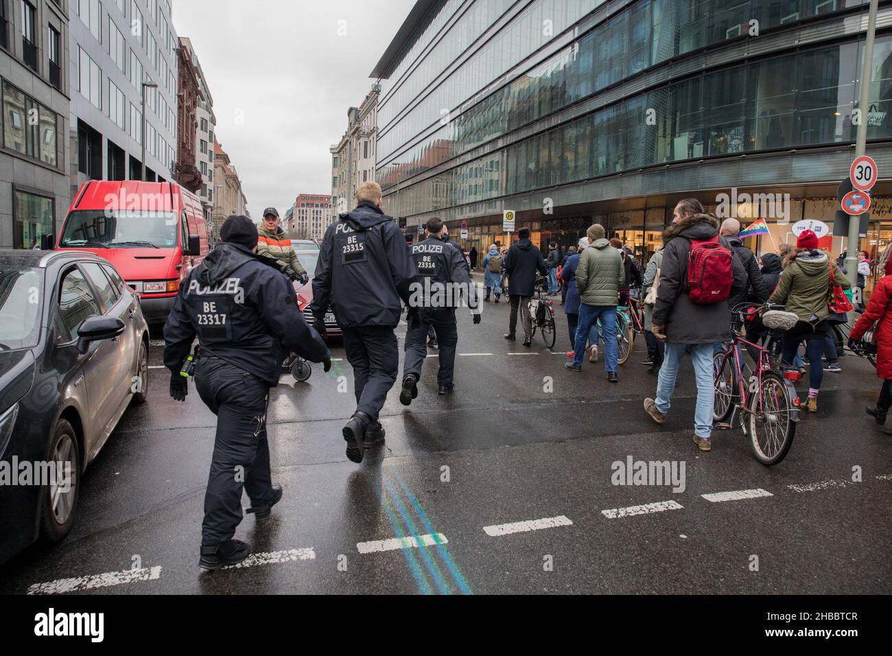 Berlin, Germany. 18th Dec, 2021. Dozens of Berlins riot police sought to control the banned march through streets in Berlin. Several demonstrators defied a protest ban. (Photo by Michael Kuenne/PRESSCOV/Sipa USA) Credit: Sipa USA/Alamy Live News Stock Photo