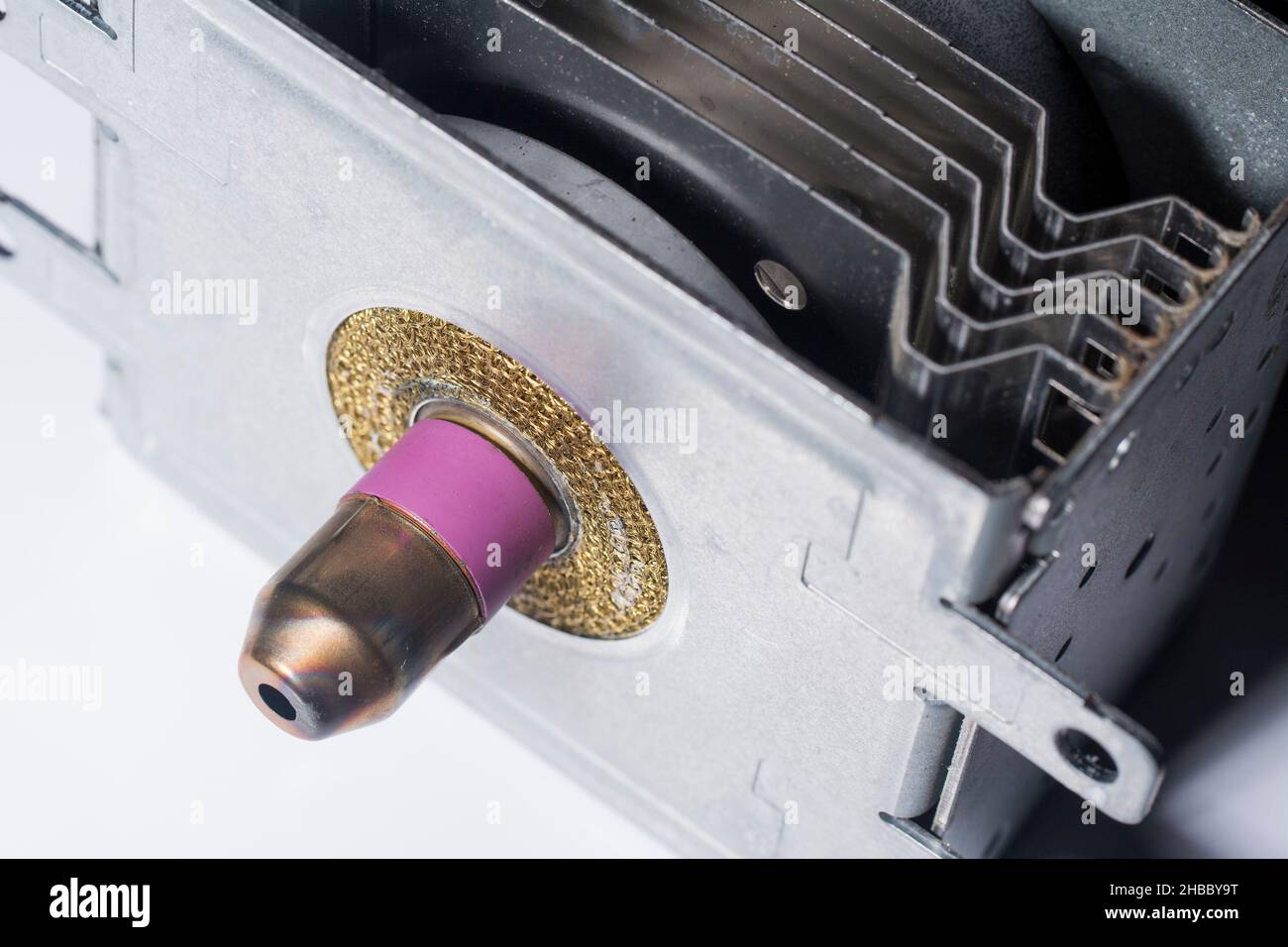 Closeup microwave magnetron, spare part for repair. Minimal technical ...
