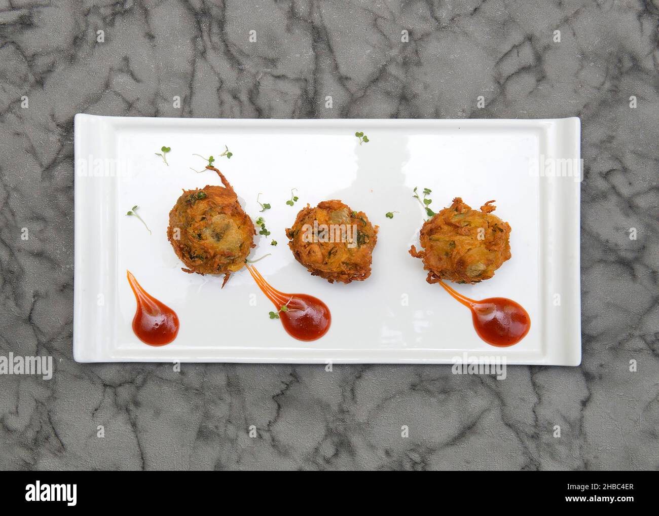Onion palak pekora Indian food Stock Photo