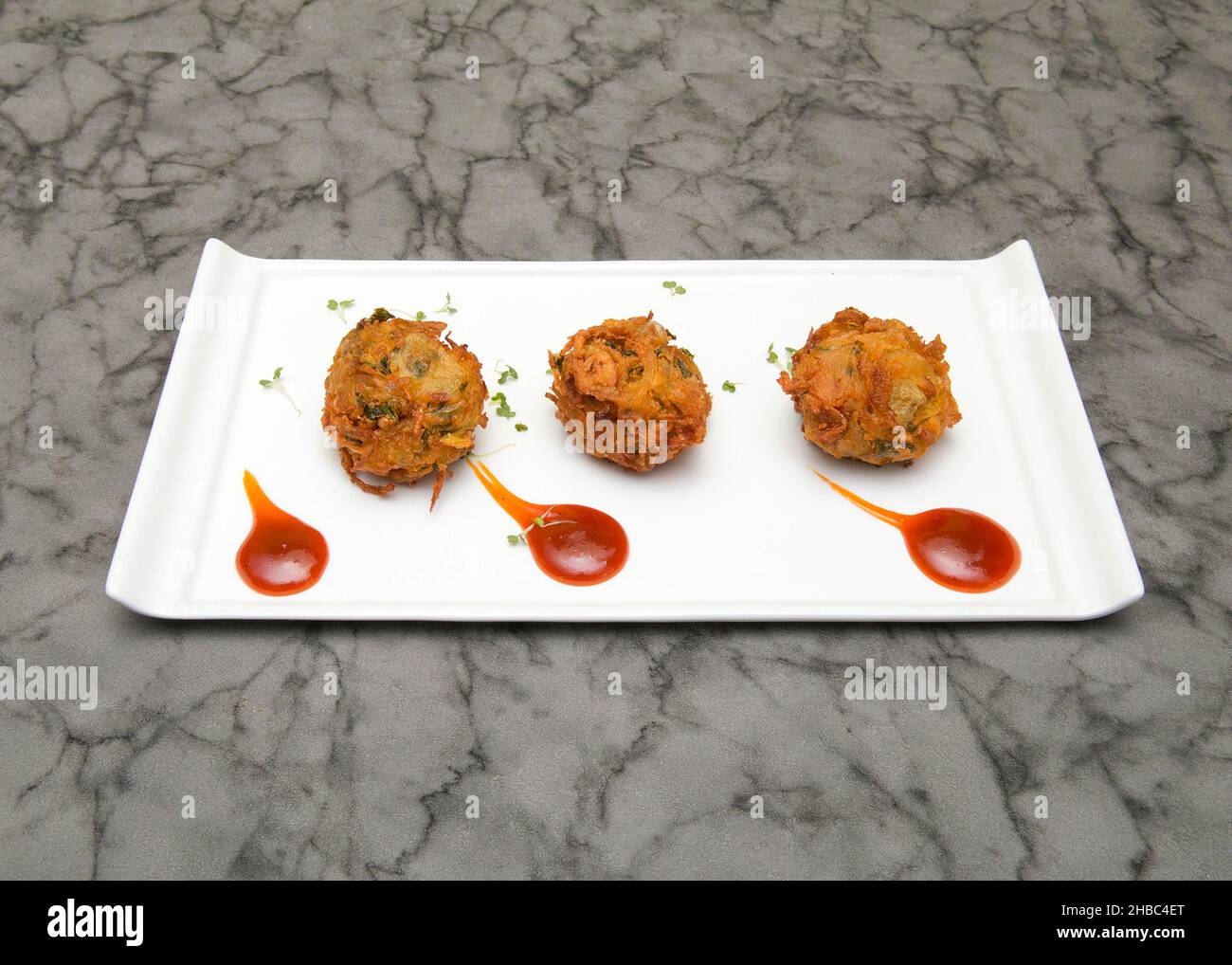 Onion palak pekora Indian food Stock Photo