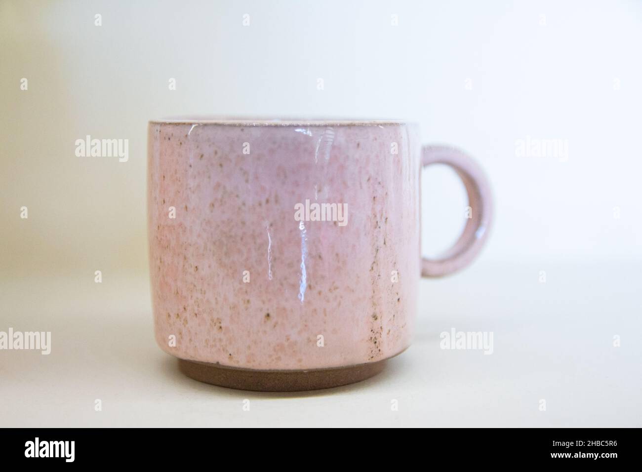 Pink mug isolated on white background Stock Photo