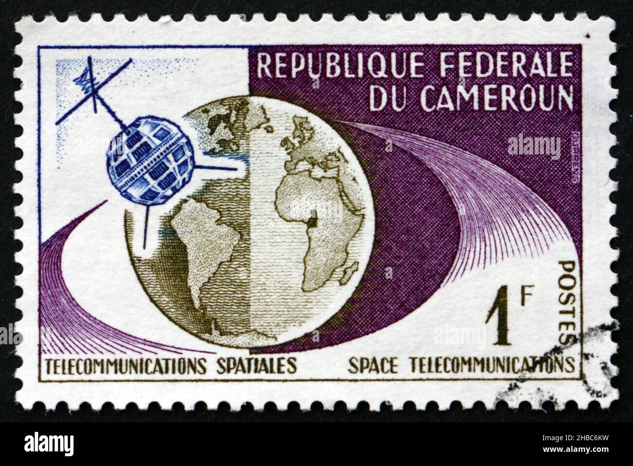 CAMEROON - CIRCA 1963: a stamp printed in Cameroon shows Telstar and Globe, 1st TV Connection of the US and Europe through the Telstar Satellite, circ Stock Photo