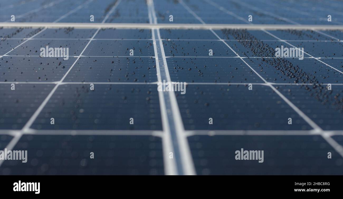 Close-up of a wet solar panel. Water droplets on the solar panel. Copy ...