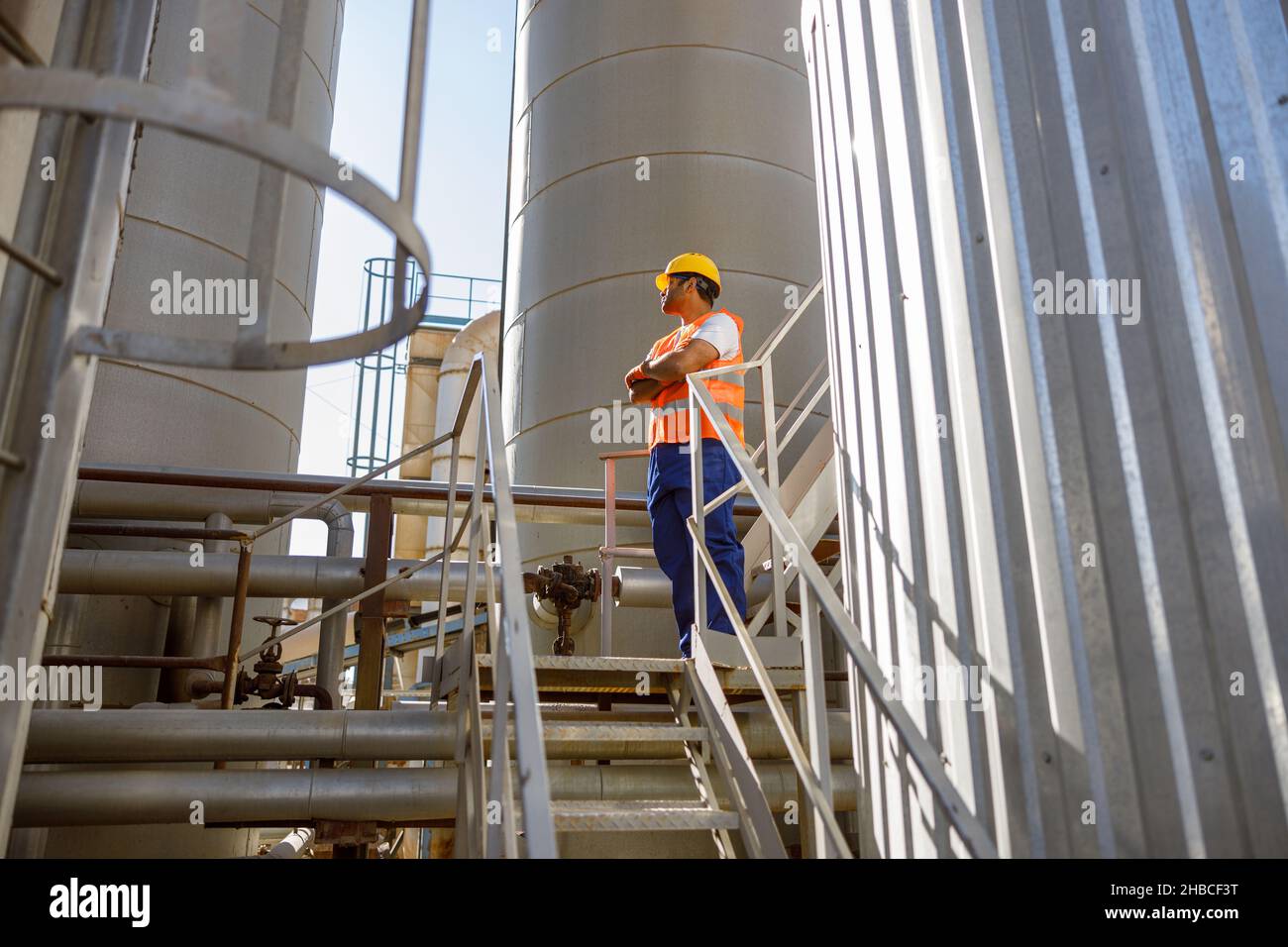 Experienced worker concentrating at his work in plant Stock Photo