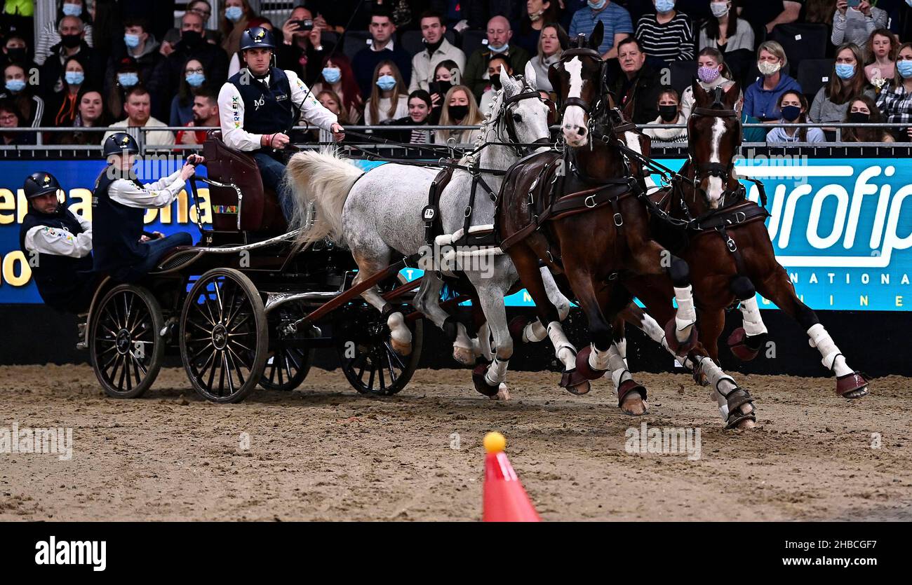 Royal Victoria Dock, United Kingdom. 18th Dec, 2021. London International Horse Show. Excel London. Royal Victoria Dock. Dries Degrieck (BEL) with horses DAGERAAD, FREDERIK-JANE, HUNTER and KANE B during class 13 - The FEI Driving World Cup. Credit: Sport In Pictures/Alamy Live News Stock Photo
