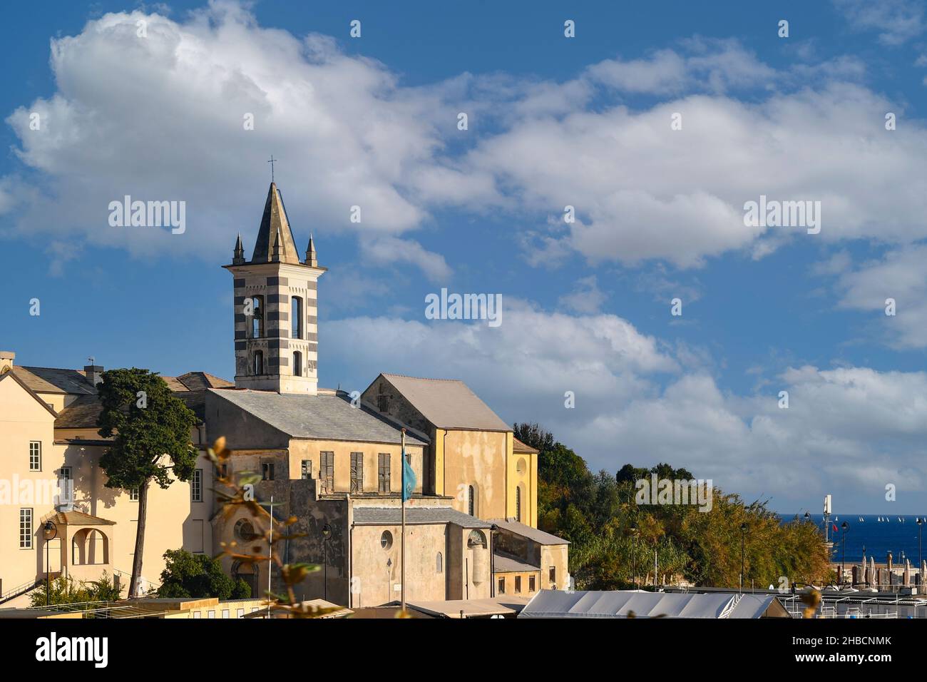 View of the medieval Abbey of San Giuliano on the seafront of the district of Albaro in a sunny day, Genoa, Liguria, Italy Stock Photo