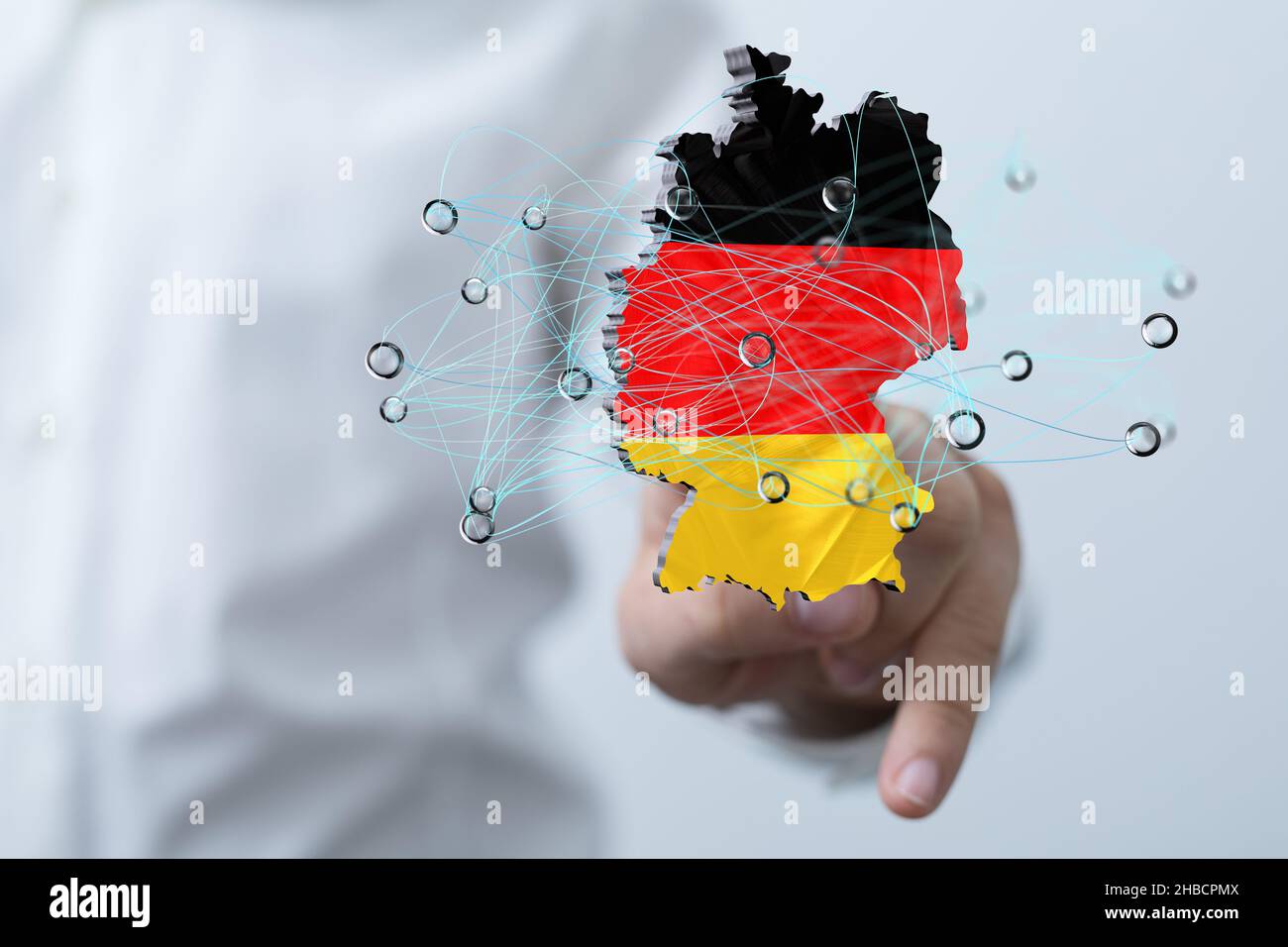 Man's hand touching on 3d rendered German map Stock Photo - Alamy
