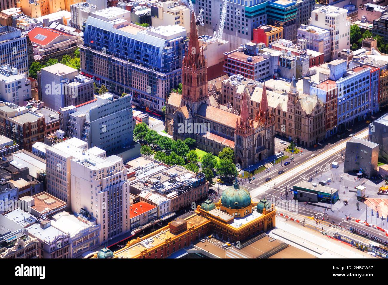 Downtown of Melbourne city around Flinders station and St Paul's cathedral in aerial view. Stock Photo
