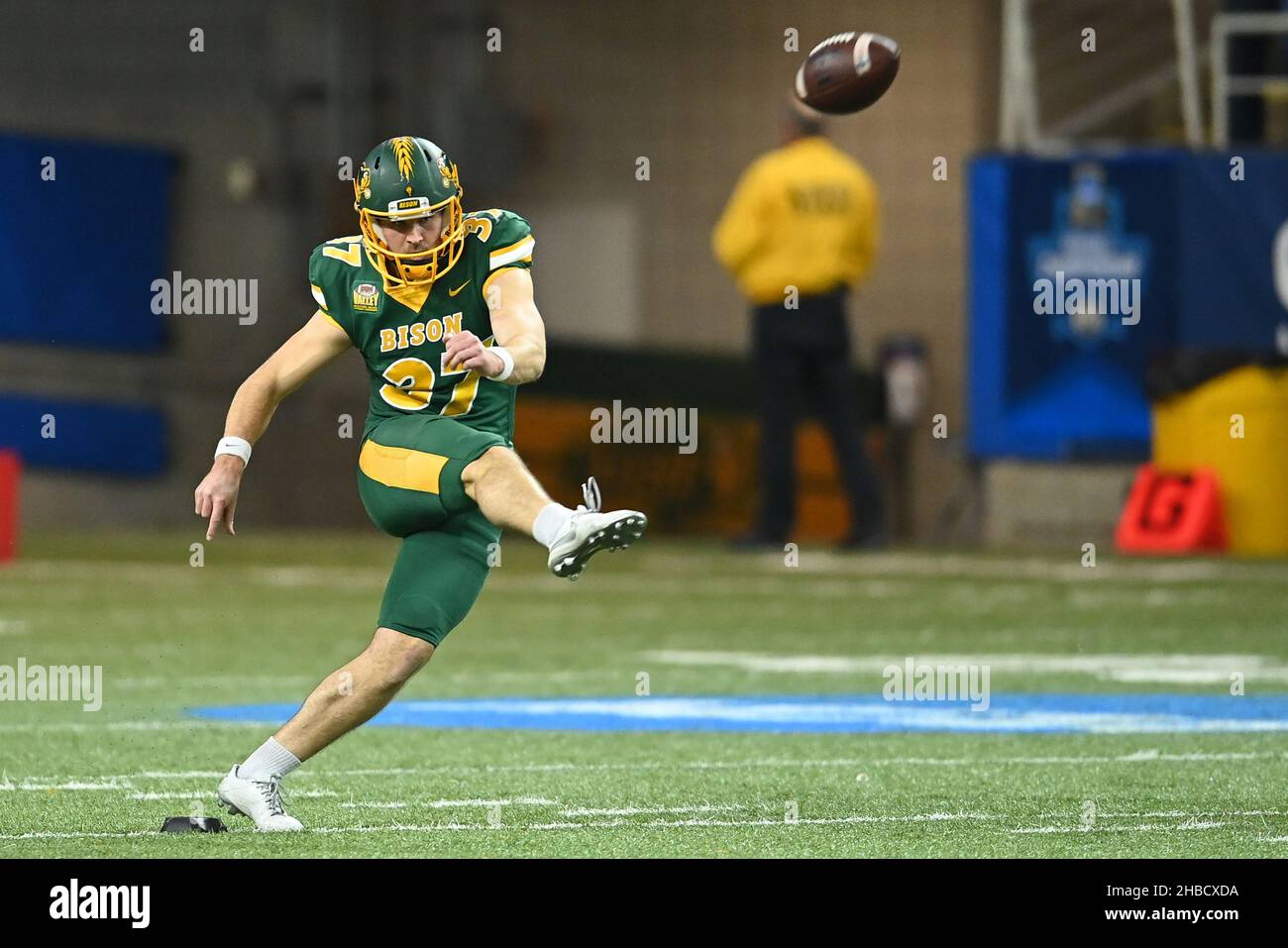 North Dakota State Bison place kicker Jake Reinholz (37) kicks off during a NCAA FCS football semi-final game between the James Madison University Dukes and the North Dakota State University Bison at the Fargo Dome, Fargo, ND on Friday, December 17, 2021. North Dakota State won 20-14. Russell Hons/CSM Stock Photo