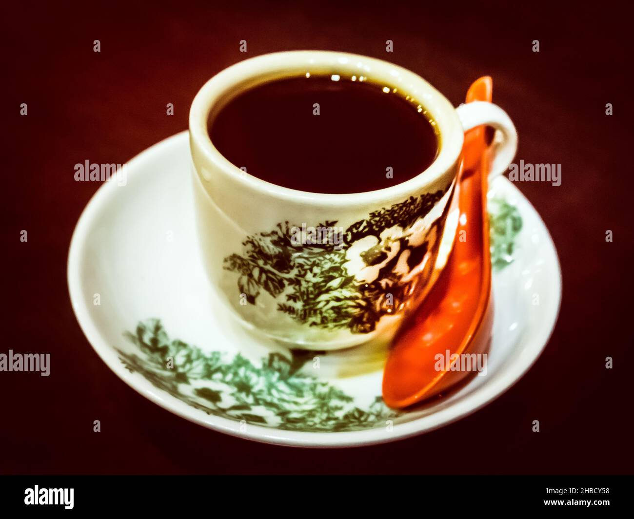 Traditional black coffee in Singapore Coffee Shop. Stock Photo