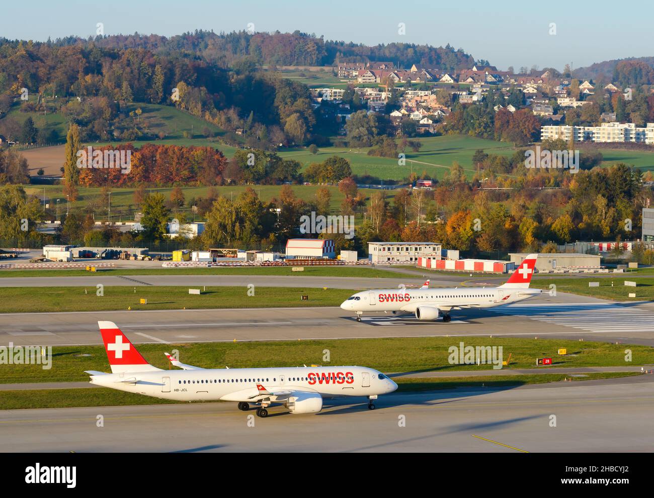 Swiss Air Lines two Airbus A220 aircraft at Zurich Airport. New modern Bombardier CS300 airplane of Swiss Airlines at Kloten Airport, Switzerland. Stock Photo