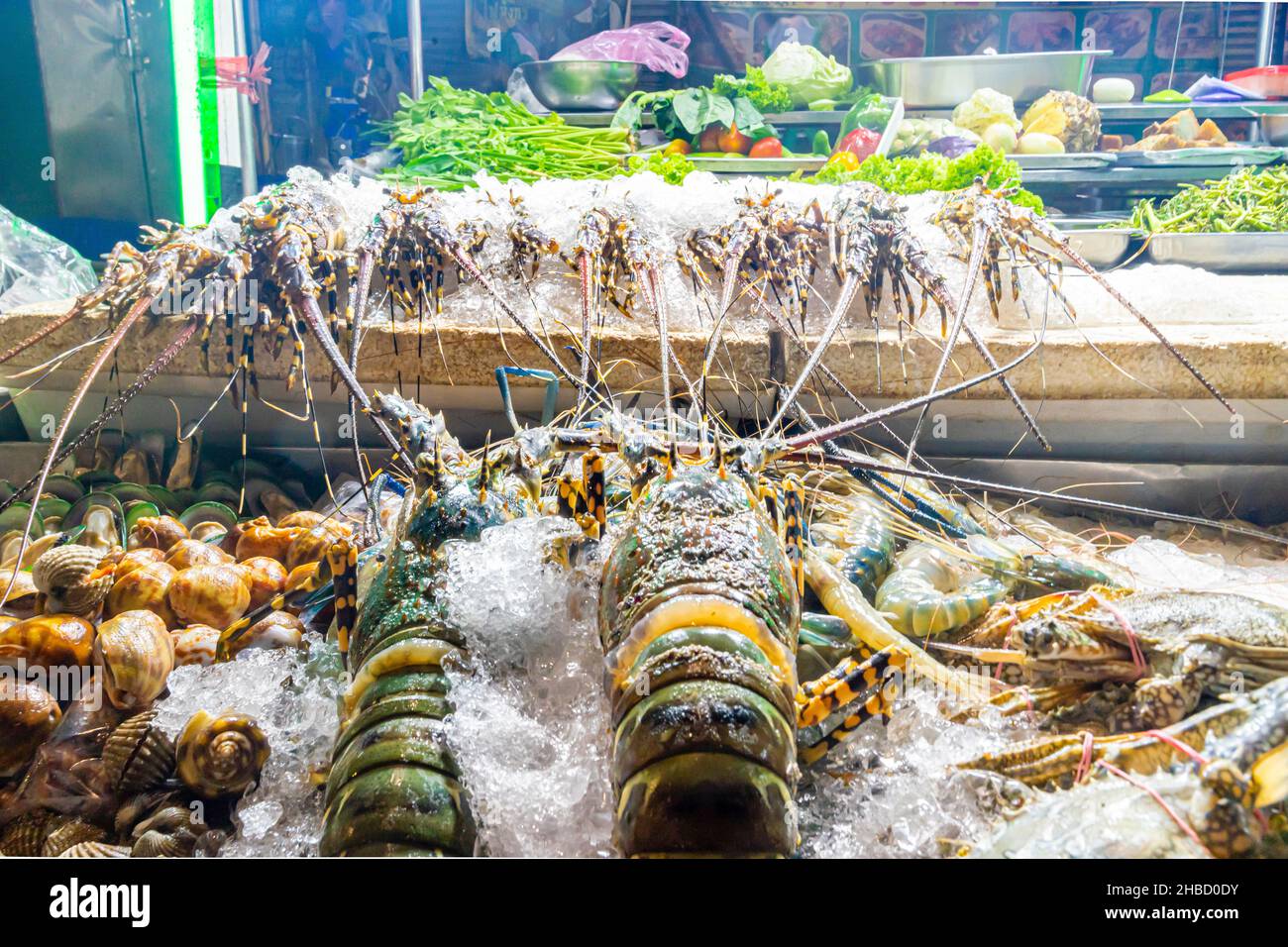 Lobsters, seafood sold on display in the night market in Chinatown of