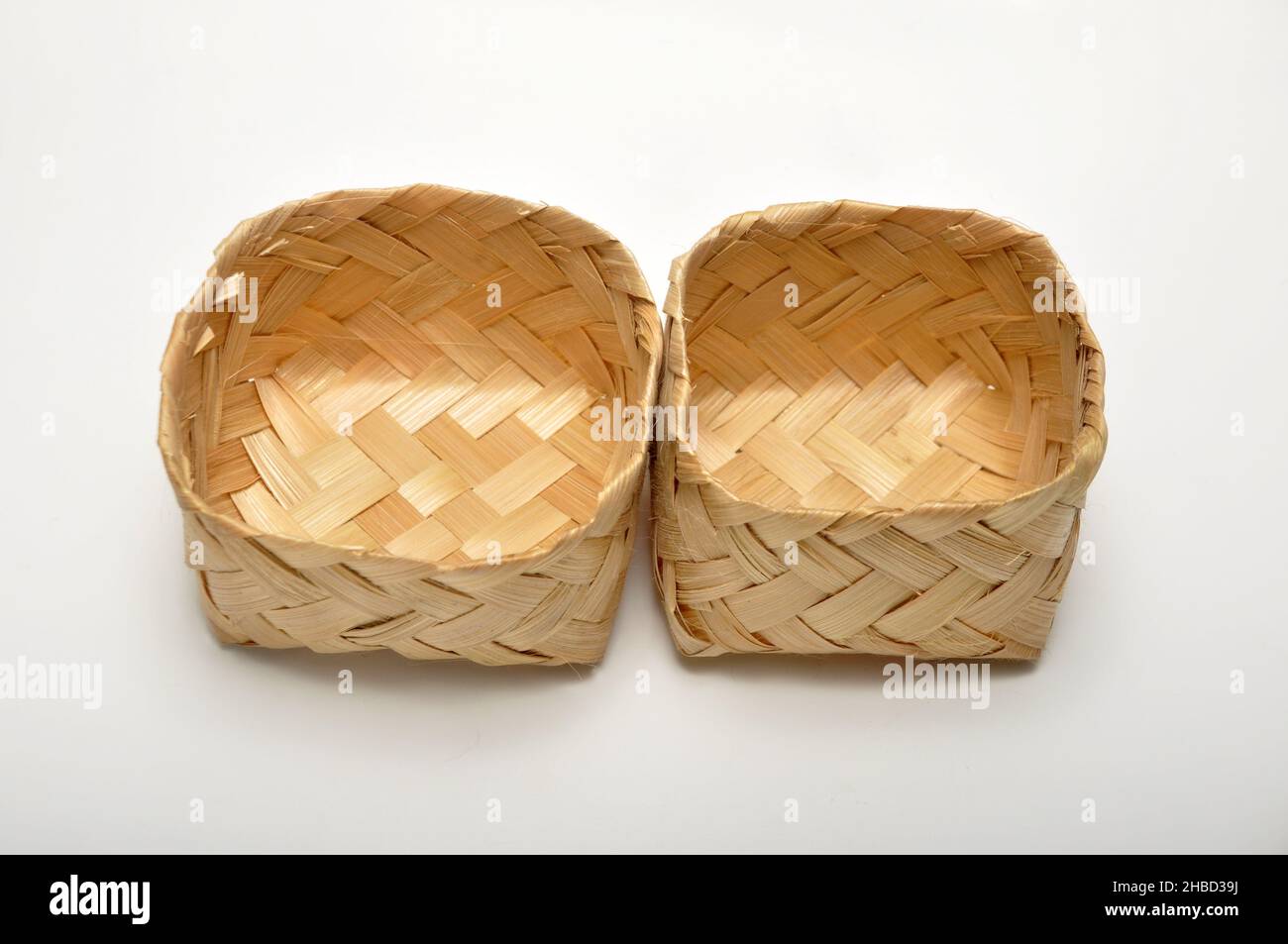 Traditional containers made of bamboo white background studio shoot ...