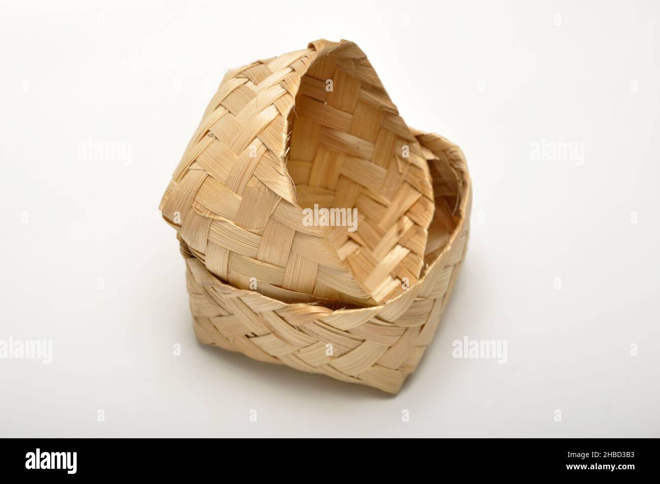 Traditional containers made of bamboo white background studio shoot ...
