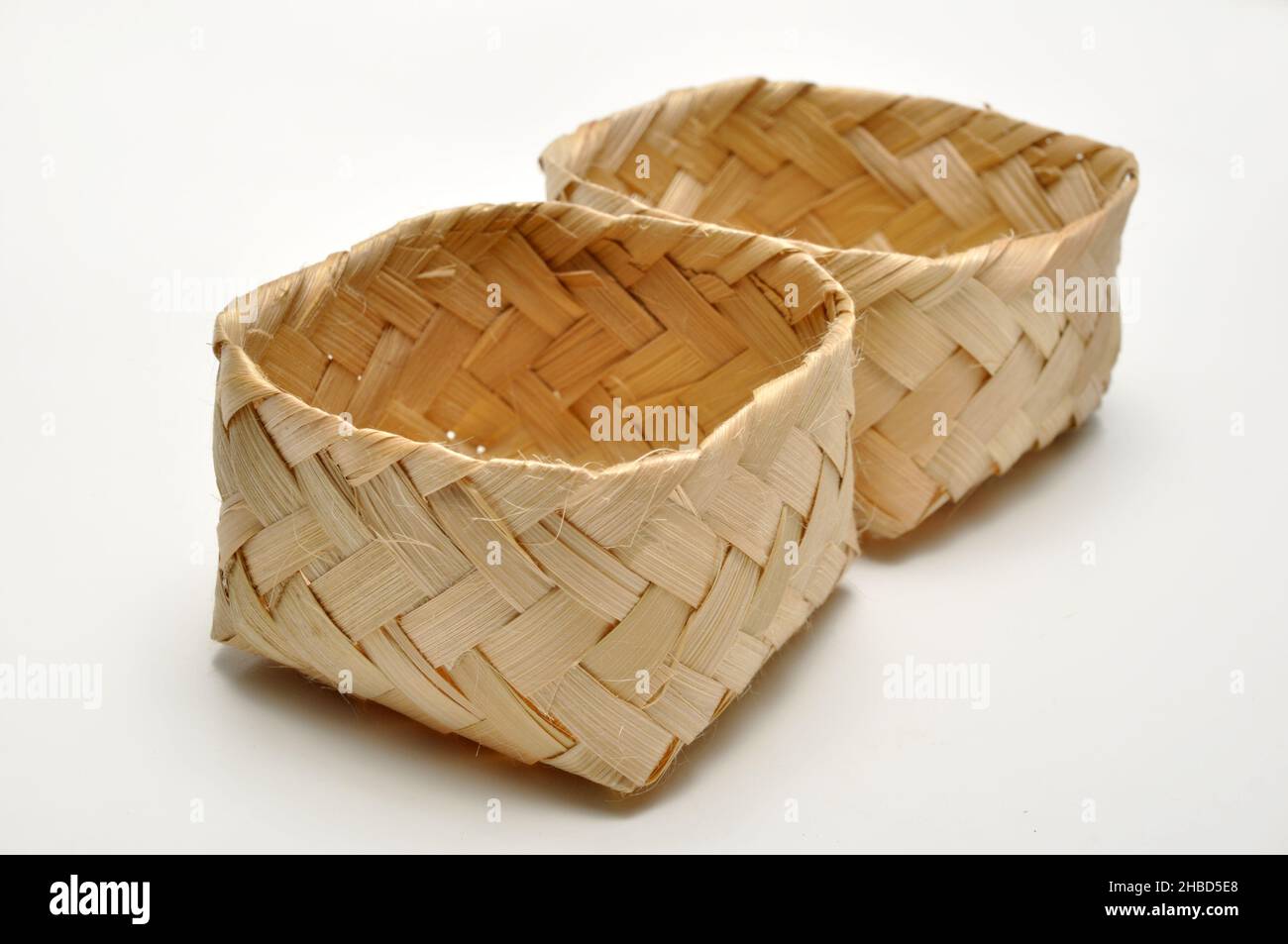 Traditional containers made of bamboo white background studio shoot ...