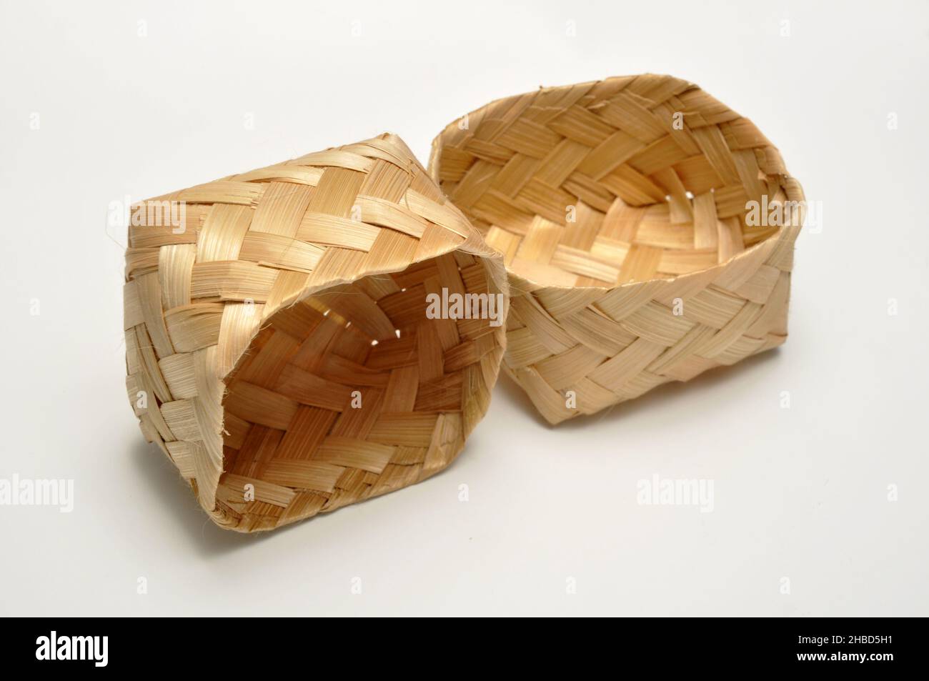 Traditional containers made of bamboo white background studio shoot ...