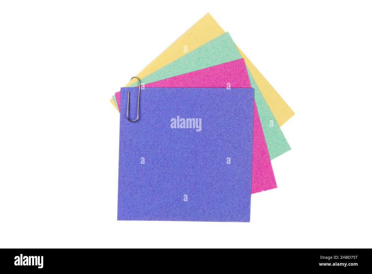 A sticker and a paper clip isolated on a white background. Copy space. Stock Photo