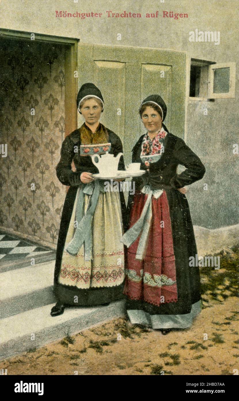 Two women in Mönchguter traditional costumes on Rügen with tea or coffee set ,  (postcard, ), Zwei Frauen in Mönchguter Trachten auf Rügen mit Tee- oder Kaffeegeschirr Stock Photo