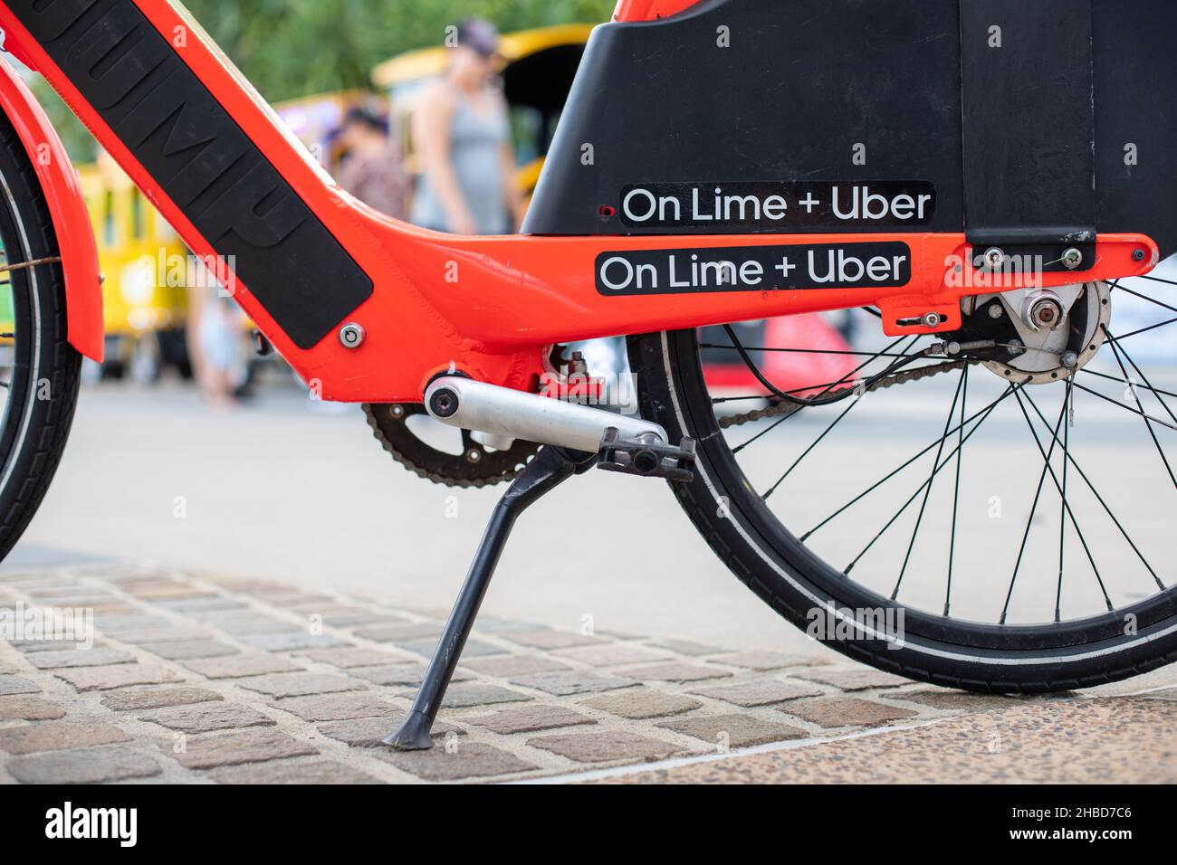 Lime uber ebike rental on the esplanade surfers paradise Stock Photo