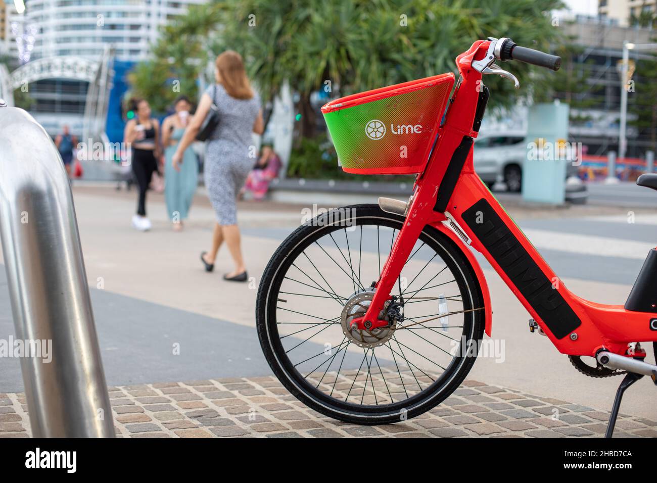 Lime uber ebike rental on the esplanade surfers paradise Stock Photo