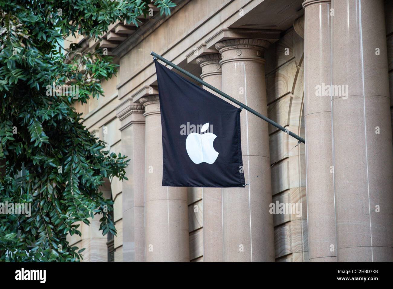 Apple store flag with logo outside of store at MacArthur Shopping